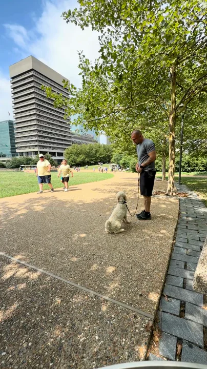 Aaron and Wrigley on the Gateway Arch grounds